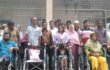 কালাইয়ে প্রতিবন্ধীদের মাঝে হুইল চেয়ার বিতরণ