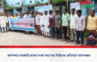 ধর্মপাশায় সরকারি জায়গা দখল করে ঘর নির্মাণের প্রতিবাদে মানববন্ধন