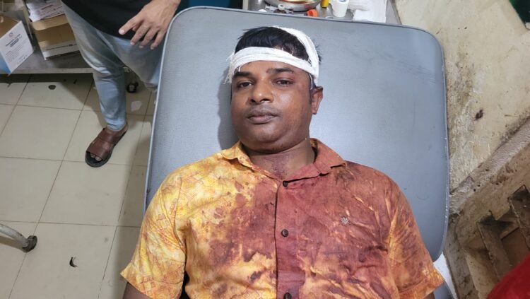 ধর্মপাশা সরকারি খাস জমি অবৈধ দখলে বাধা দেওয়ায় প্রধান শিক্ষককে কুপিয়ে সন্ত্রাসীরা